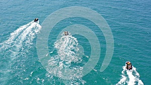 Navy Commando special forces on rubber boats roaring across the sea.