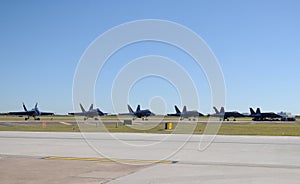 Navy jets parked on the ground