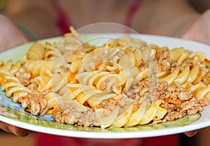 Navy macaroni in a plate of minced meat
