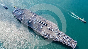 Navy Nuclear Aircraft carrier, Military navy ship carrier full loading fighter jet aircraft, Aerial view