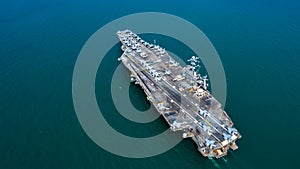 Navy Nuclear Aircraft carrier, Military navy ship carrier full loading fighter jet aircraft, Aerial view photo