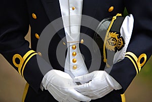 Navy Officer Holding his Cap