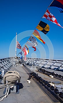 Navy ship bow with nautical flags