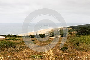 Nazare, Portugal - June 30, 2021: View of the North Beach, one of Europe's most popular surfing areas, from Nazare Sito