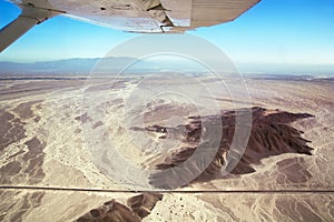 Nazca Lines airplane over desert