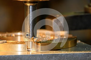 The NC milling machine chamfer cut the brass material parts