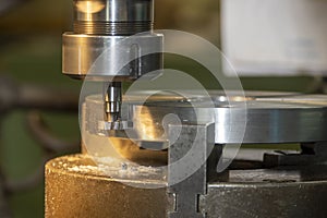 The NC milling machine T-slot cutting the metal parts