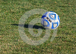 NCAA College Soccer Ball on Grass Field