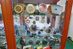 Ncient dials standing behind the glass of the museum. Collected from various mechanisms of the watch`s speedometers.