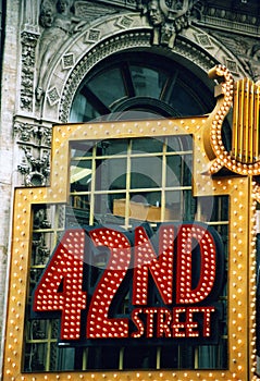 42 nd street light sign on the old building in New York city center