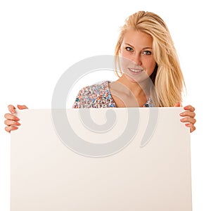 Nde woman holding a blank white board in her hands for promotion