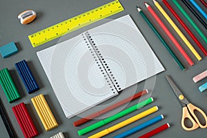 Nealty Organized Colorful School Supplies on Desk