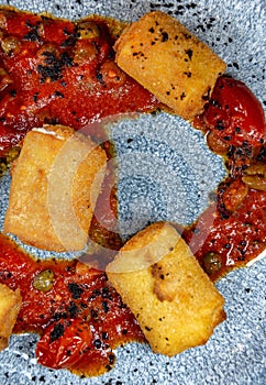 Neapolitan fried panzarotto, filled with mozzarella and tomato