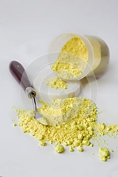 Neapolitan yellow pigment on a white background