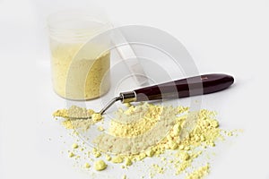 Neapolitan yellow pigment on a white background