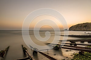 Near fishing village. Long exposure sea sunrise