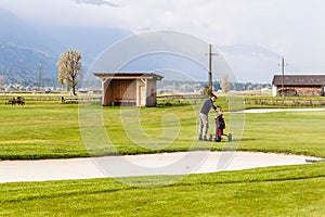 Near a golf sand bunker