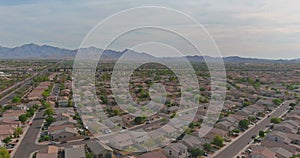 Near Phoenix Arizona Avondale city the aerial view of residential houses neighborhood and apartment complex aerial drone