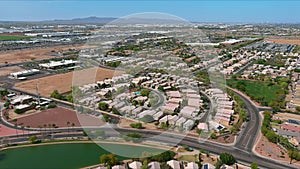Near Phoenix Arizona Avondale city the aerial view of residential houses neighborhood and apartment complex aerial drone