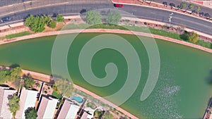 Near Phoenix Arizona Avondale city the aerial view of residential houses neighborhood and apartment complex aerial drone