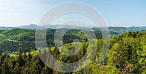 Nearer hills of Kysucka vrchovina mountains and Mala Fatra mountains on the background from lookout tower on Smrekovka hill above