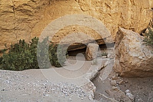 Nearly Hidden Entrance to the Nekarot Cave in the Makhtesh Ramon Crater in Israel