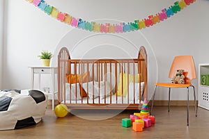 Neat furnished baby room photo