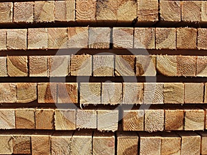 Neat softwood beam in stacks of texture for the background