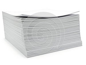 A neat stack of white printer paper on a clean surface