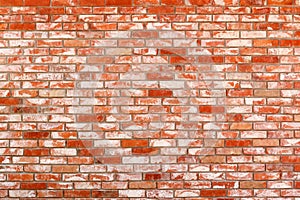 Neat wall of old, reuse red ceramic brick. Grunge background, texture