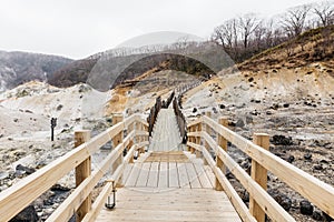 Neat wooden walk way at Noboribetsu Jigokudani Hell Valley: The volcano valley got its name from the sulfuric smell.