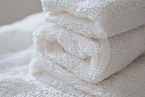 Neatly Folded Stack of White Towels