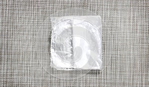 Neatly folded Transparent plastic shopping bag on the table