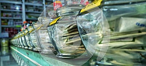 neatly lined glass jars on the table