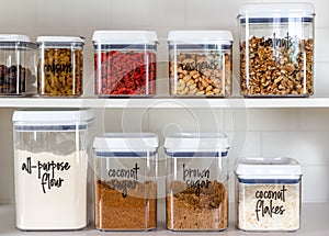 Neatly organized transparent canisters for baking ingredients photo