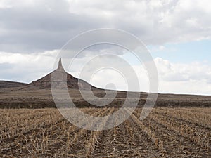 Nebraska`s Chimney Rock with Field in Foreground
