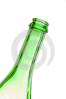 The neck of an empty bottle at an angle