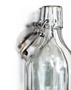 Neck of glass bottles with a porcelain stopper