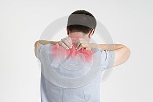 Neck pain, man with backache on gray background