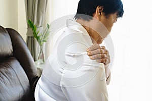 Neck and shoulder pain, old woman suffering from neck and shoulder injury, health problem concept