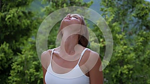 Neck stretching exercise. Woman doing up and down nods