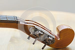 Neck of a stringed instrument mandoline part