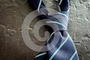 Neck tie on black background