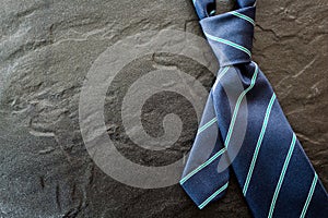 Neck tie on black background