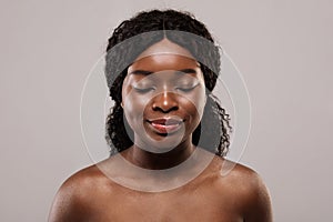 Neck Wrinkles Treatment. Portrait Of Beautiful Black Naked Woman With Closed Eyes