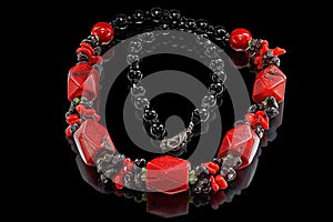 Necklace of agate, red coral and garnet