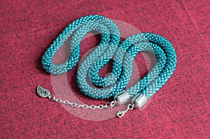 Necklace of color aquamarine from beads