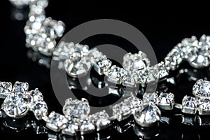 Necklace with diamonds close-up on a black background