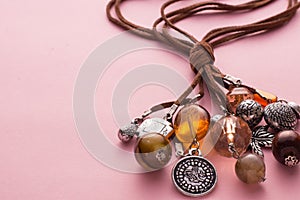 Necklace Made with Brown Leather and Silver Charms