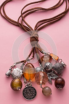 Necklace Made with Brown Leather and Silver Charms